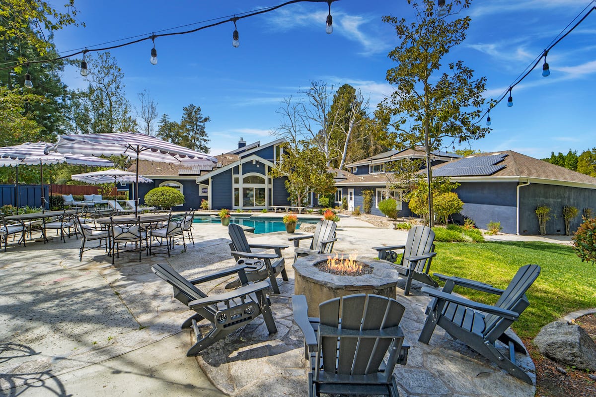 Outdoor lounge and entertaining setting at Peaceful Pond House