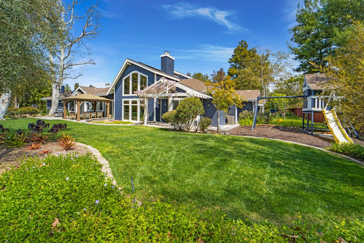 Peaceful Pond House exterior and lawn in Poway