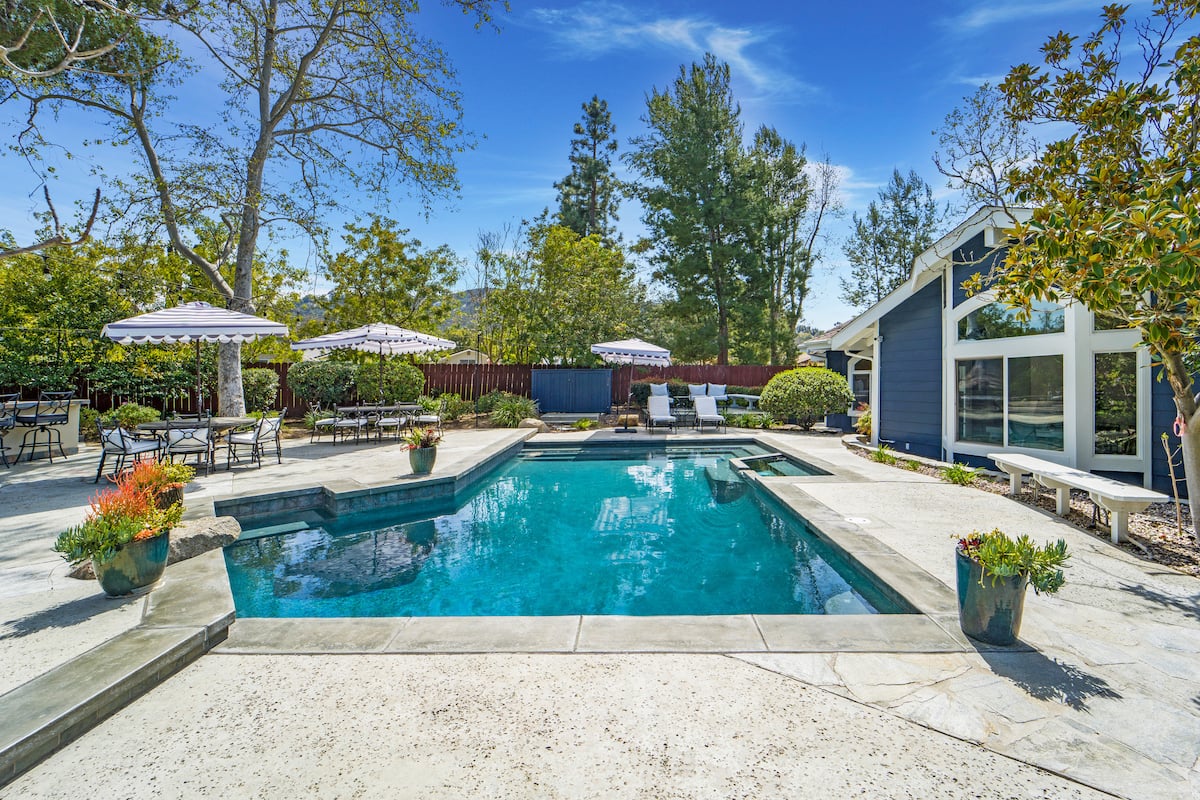 Pool and spa beside the house at Peaceful Pond House in Poway